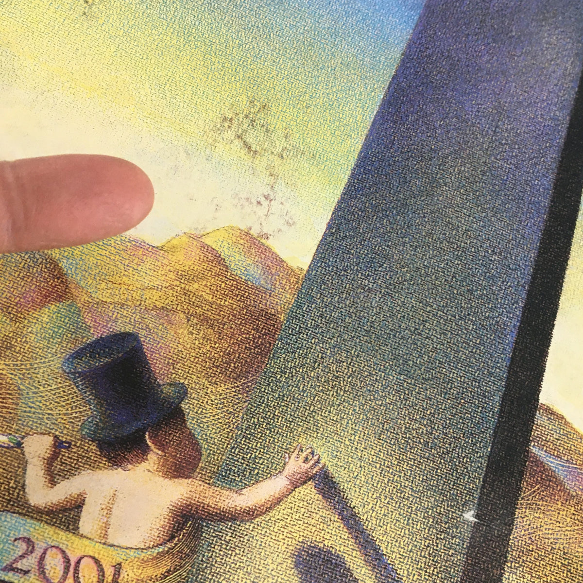 Close-up of the cover of The New Yorker magazine from January 8, 2001, focusing on details of the illustration 'The Year 2001' by Raul Colón, showing minor wear.