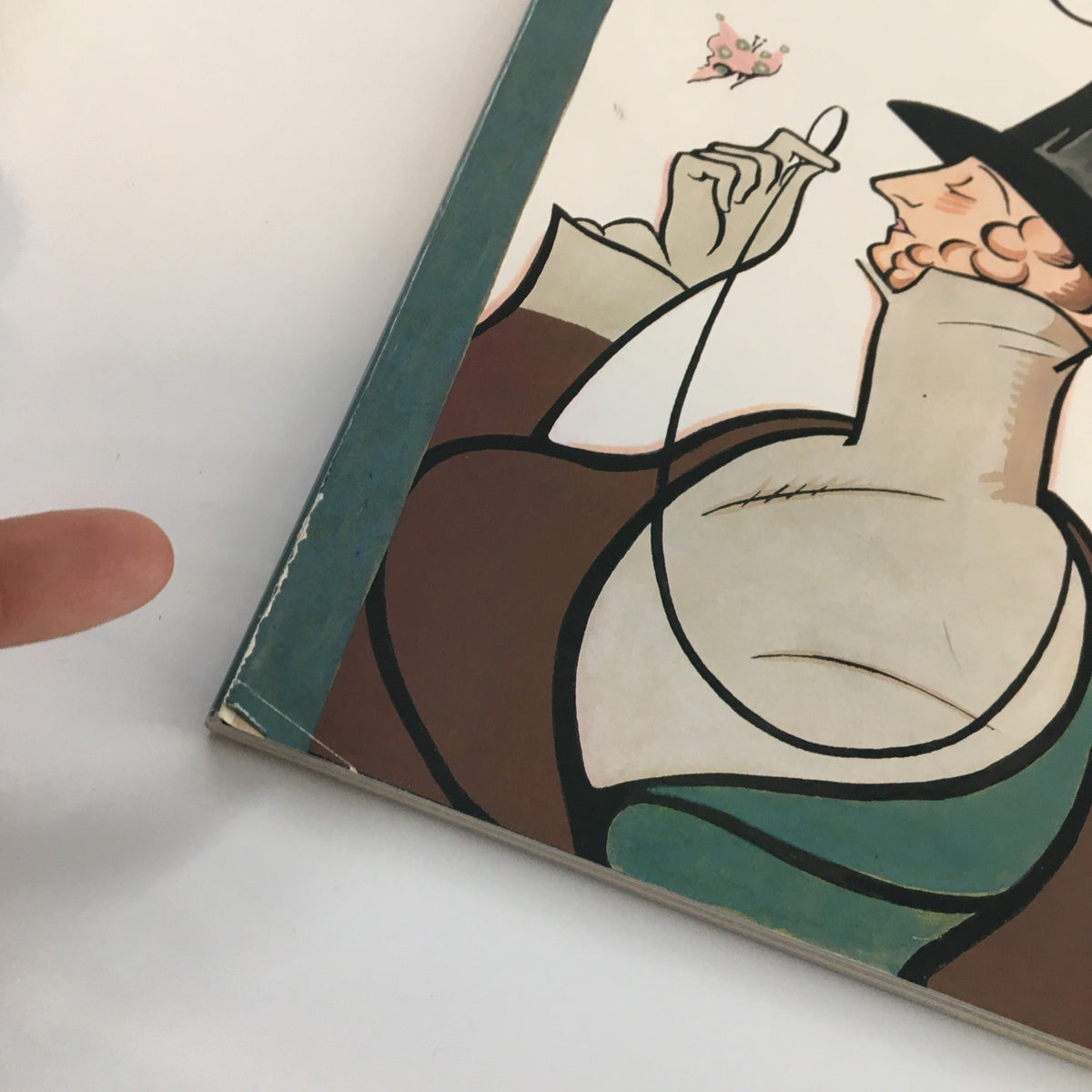 Close-up of the cover edge of The New Yorker Full Magazine February 19, 2001, showcasing minor wear, highlighting its vintage appeal.