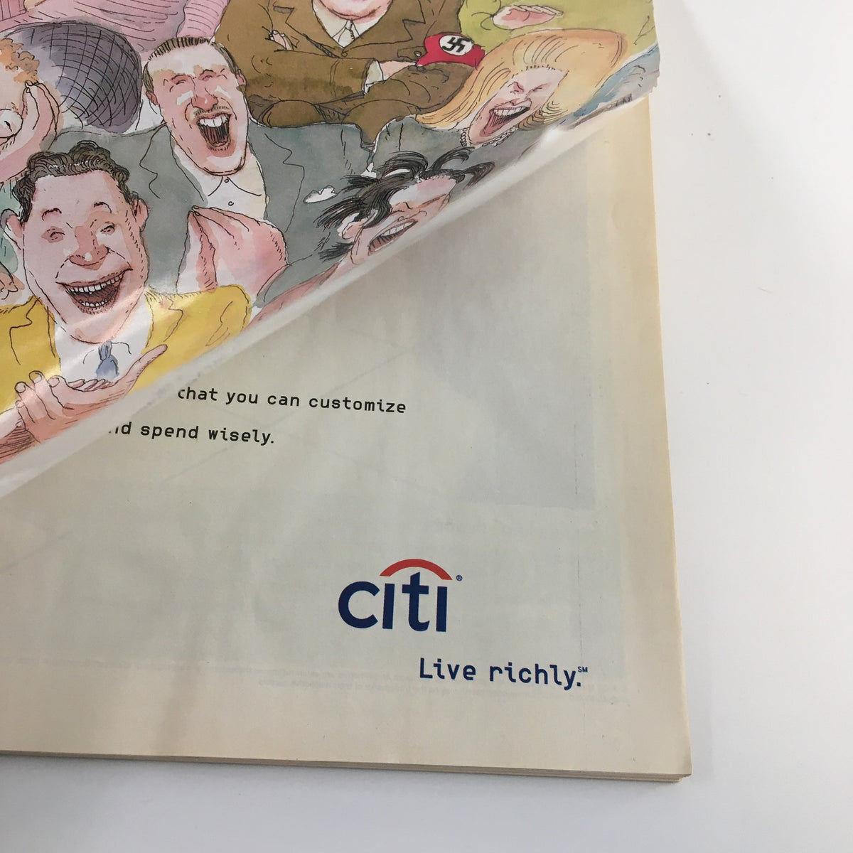 Inside view of The New Yorker Full Magazine May 7 2001, showcasing a partial page with an advertisement for Citi, beneath the humorous cover by Barry Blitt. This page adds to the historical context of the vintage magazine.