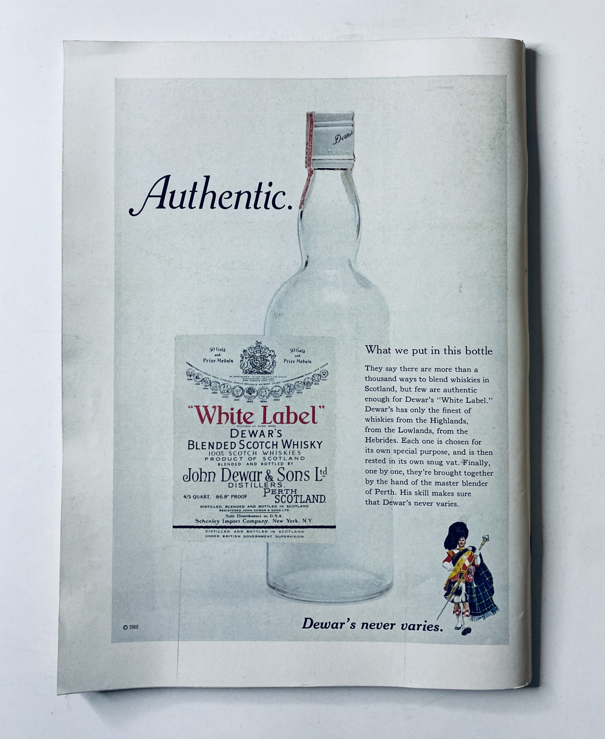 Dewar's White Label Blended Scotch Whisky advertisement featuring a clear bottle with a label, captioned 'Authentic.' The ad showcases Dewar's commitment to quality, aligning with the theme of The New Yorker Magazine October 17, 1970 cover by William Steig.