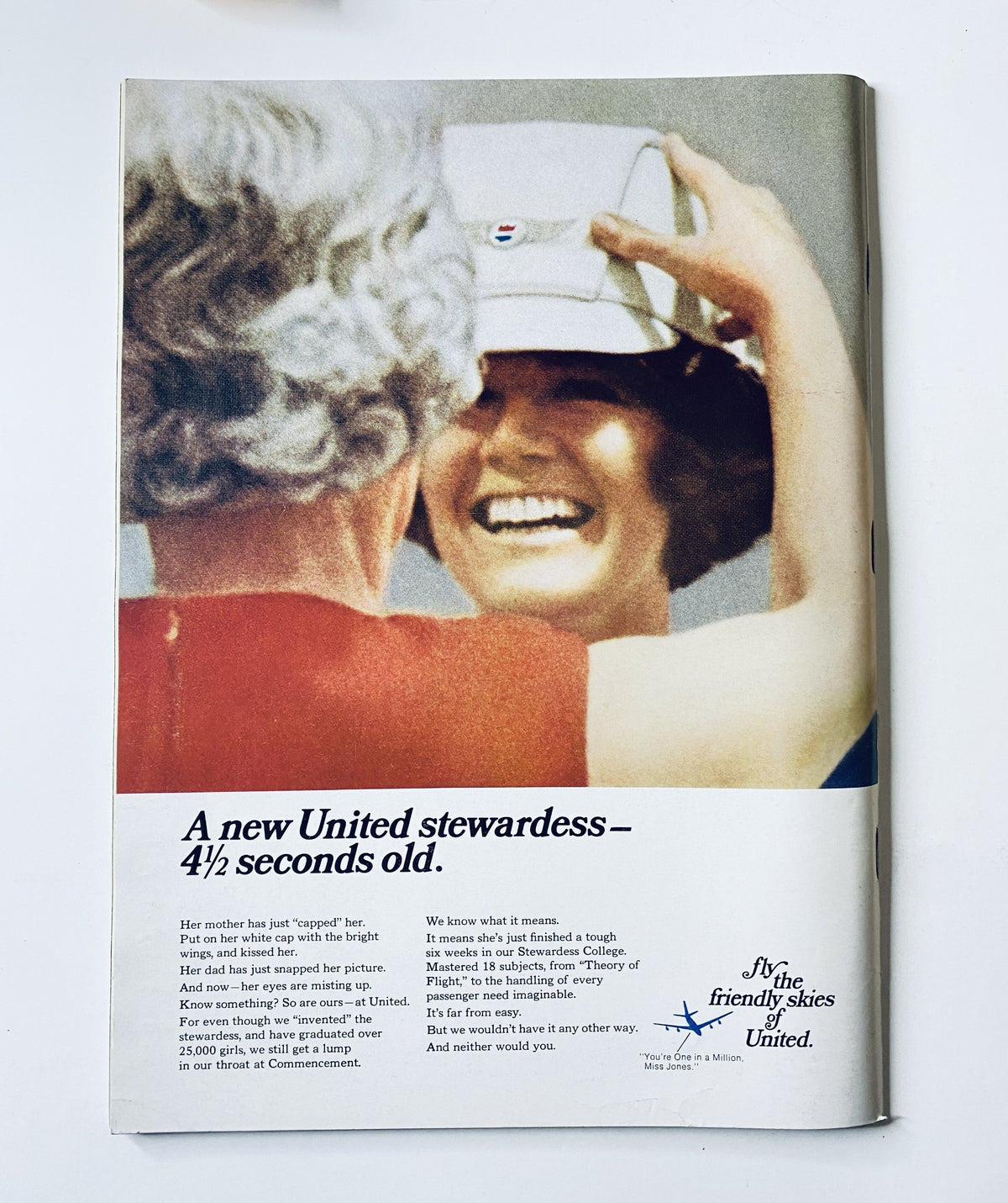 Advertisement showcasing a smiling United stewardess with joyful passengers, part of The New Yorker Magazine February 28, 1970, James Stevenson Hockey Cover VG.