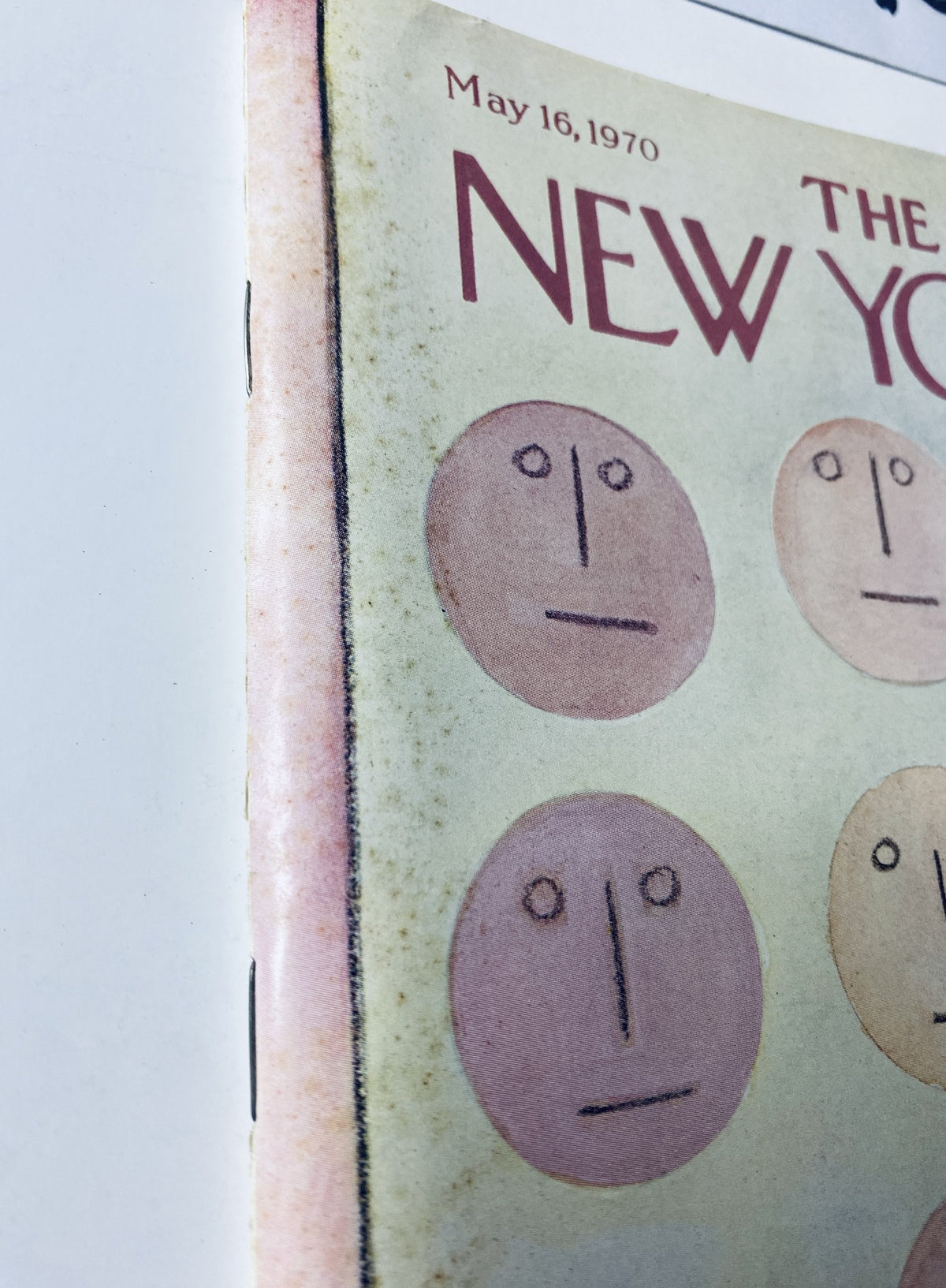 Side view of The New Yorker Magazine, May 16, 1970, showing details of the cover with simple face illustrations by André François.