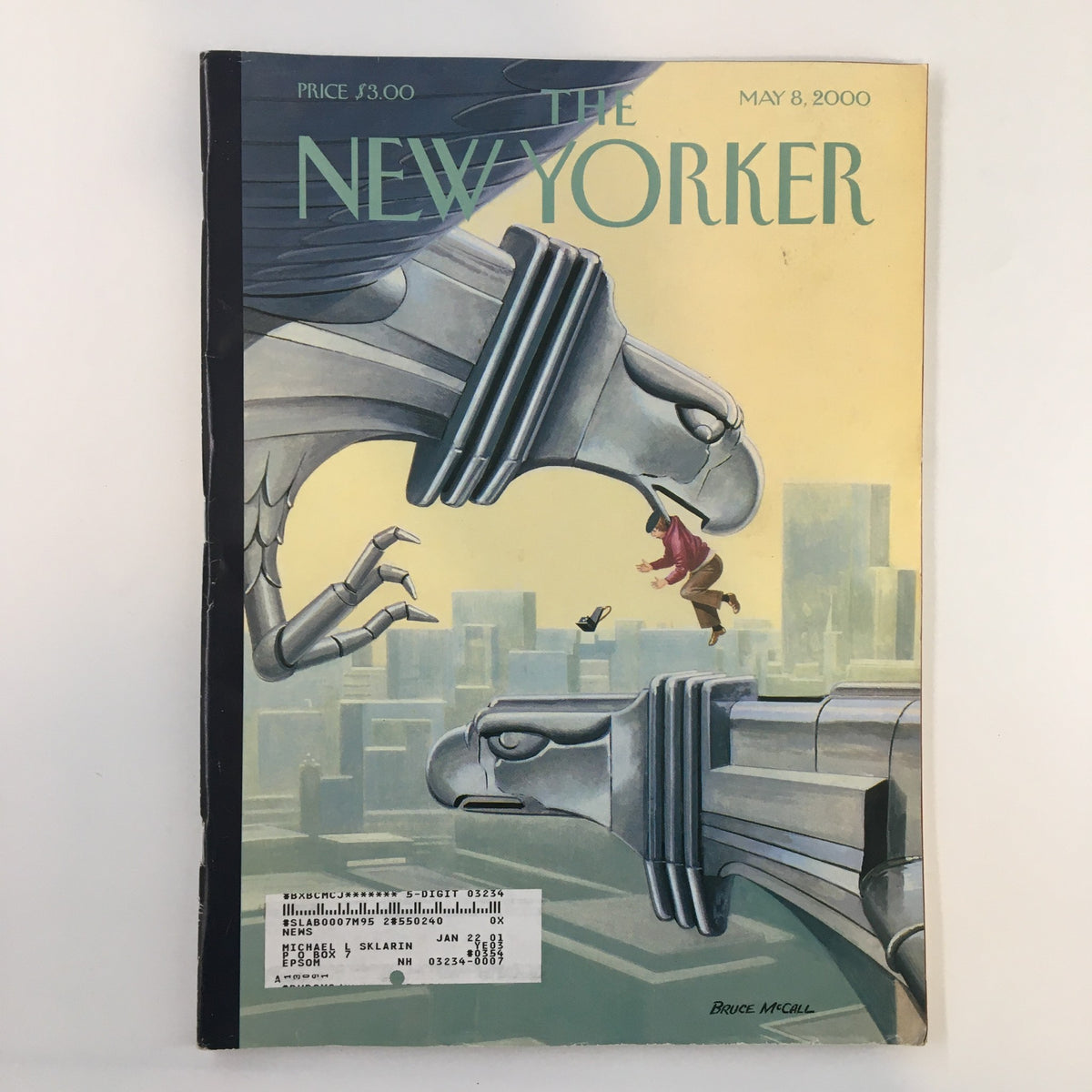 Cover of The New Yorker Full Magazine May 8, 2000 featuring the artwork 'Photo Opportunity' by Bruce McCall, showcasing a whimsical scene with two gargoyles and a figure flying between them.