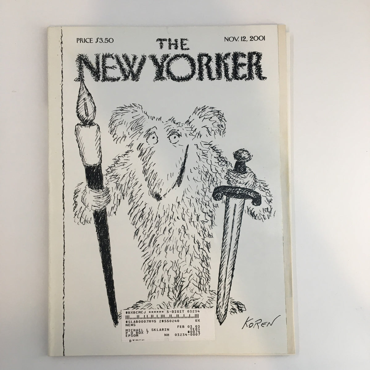 The New Yorker Full Magazine November 12, 2001 featuring the cartoon 'Best Offense' by Edward Koren, showcasing a whimsical character holding a sword and a torch on the cover.