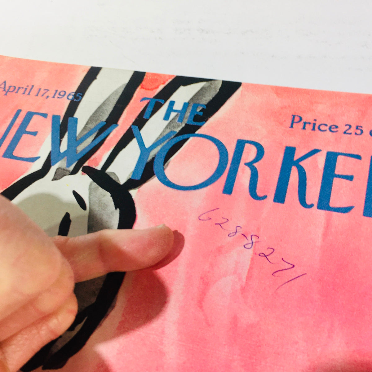 Detail of The New Yorker April 17 1965 magazine cover showcasing the vibrant pink theme and handwritten note, highlighting its vintage appeal for collectors.