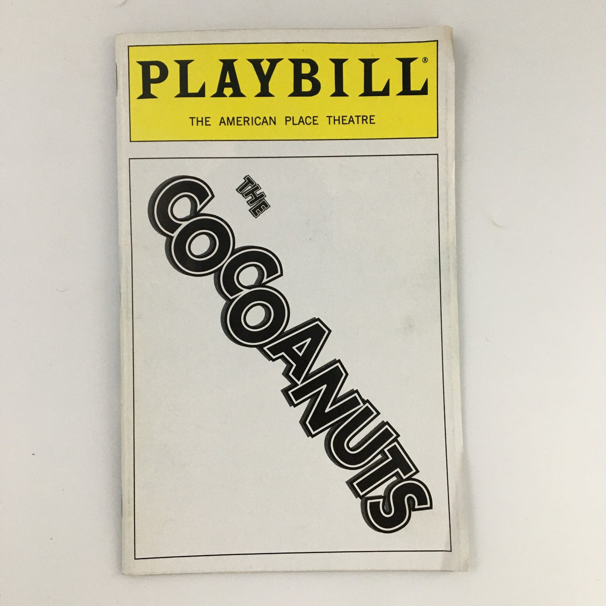 1996 Playbill for 'The Cocoanuts' from The American Place Theatre, featuring a bold design and classic typography.