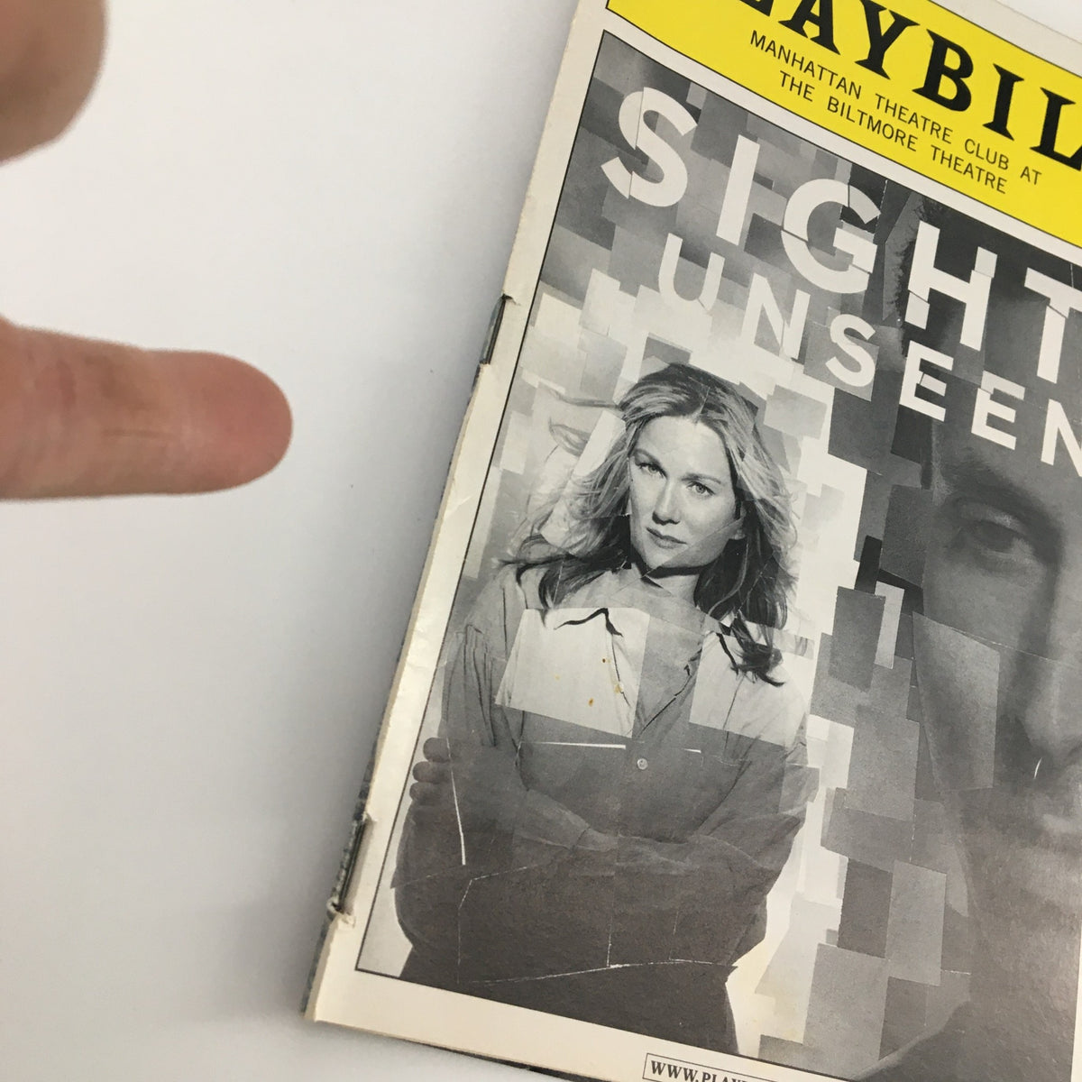 Close-up view of the 2004 Playbill for 'Sight Unseen' highlighting Laura Linney on the cover.