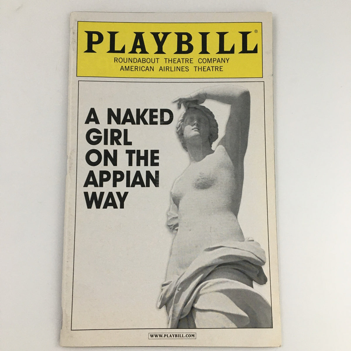 Cover of the 2005 Playbill for 'A Naked Girl On The Appian Way' at American Airlines Theatre featuring a statue.