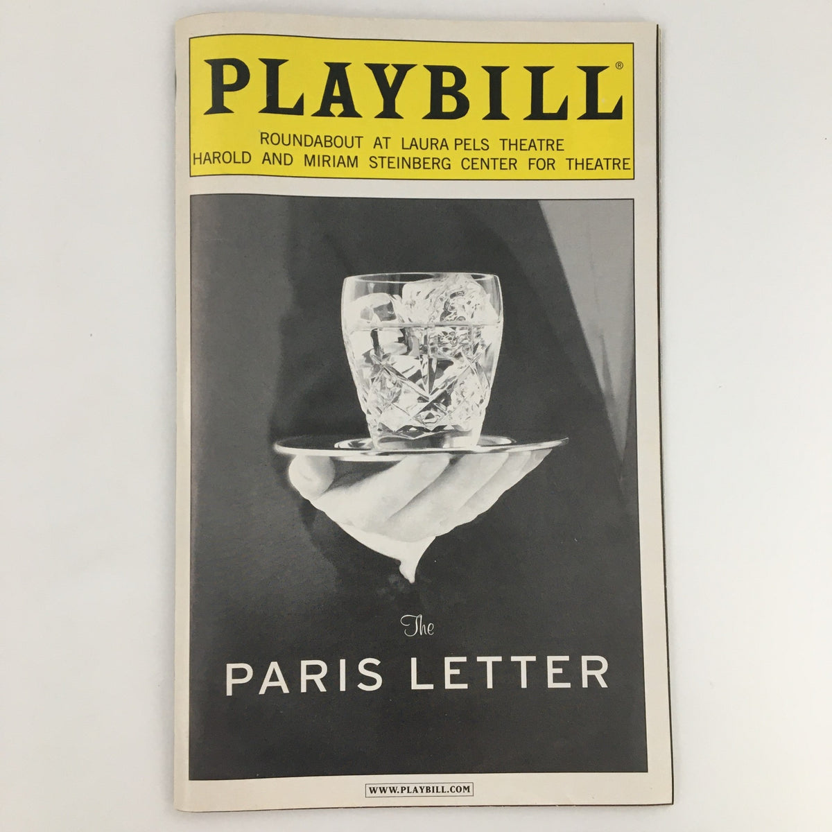 2005 Playbill of 'The Paris Letter' from Roundabout Theatre Company, featuring a glass of whiskey on ice held on a silver tray, showcasing the captivating production.