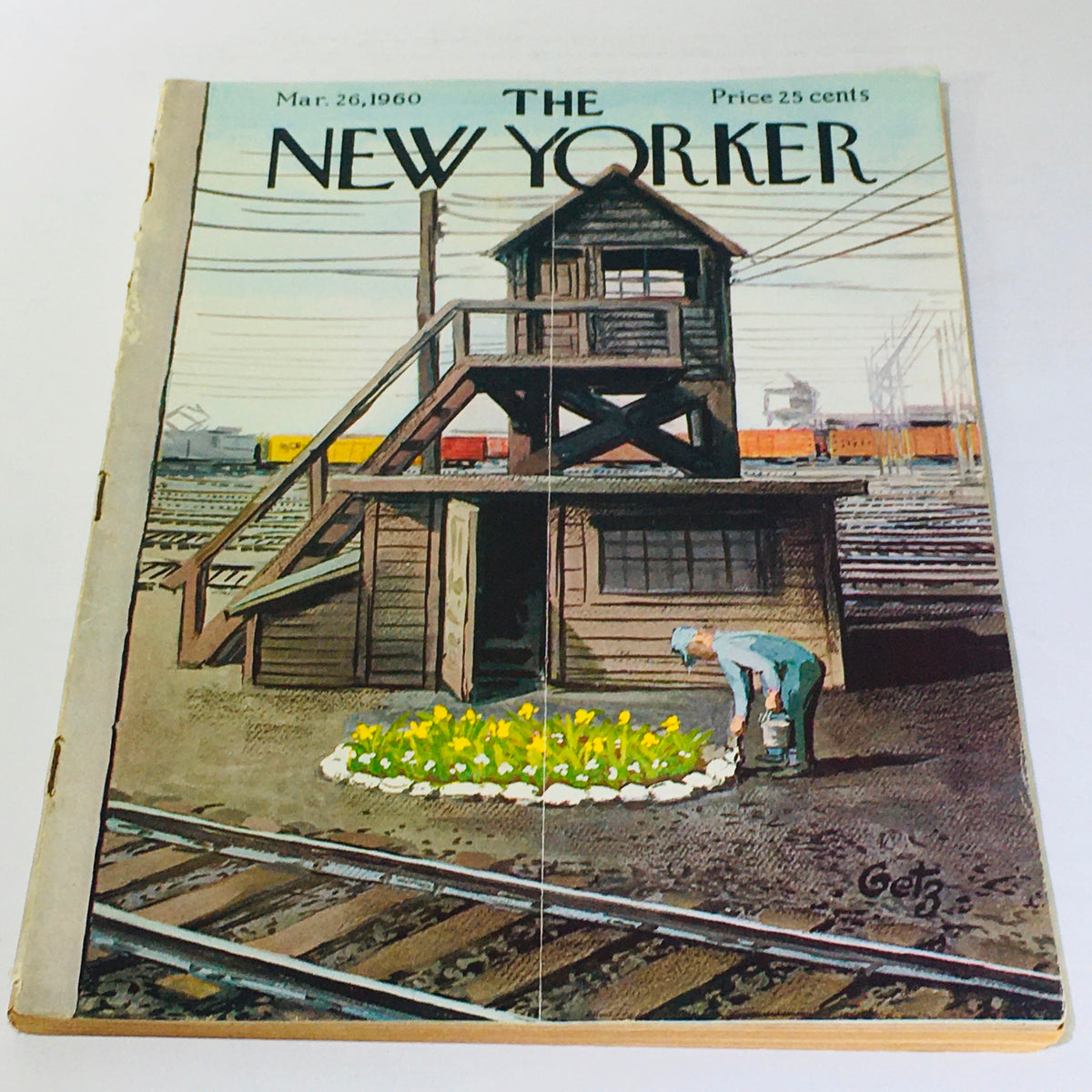 The New Yorker: March 26 1960 Full Magazine cover by Arthur Getz, featuring a rail yard scene with a man tending to flowers and a wooden tower in the background, capturing the essence of New York City culture.