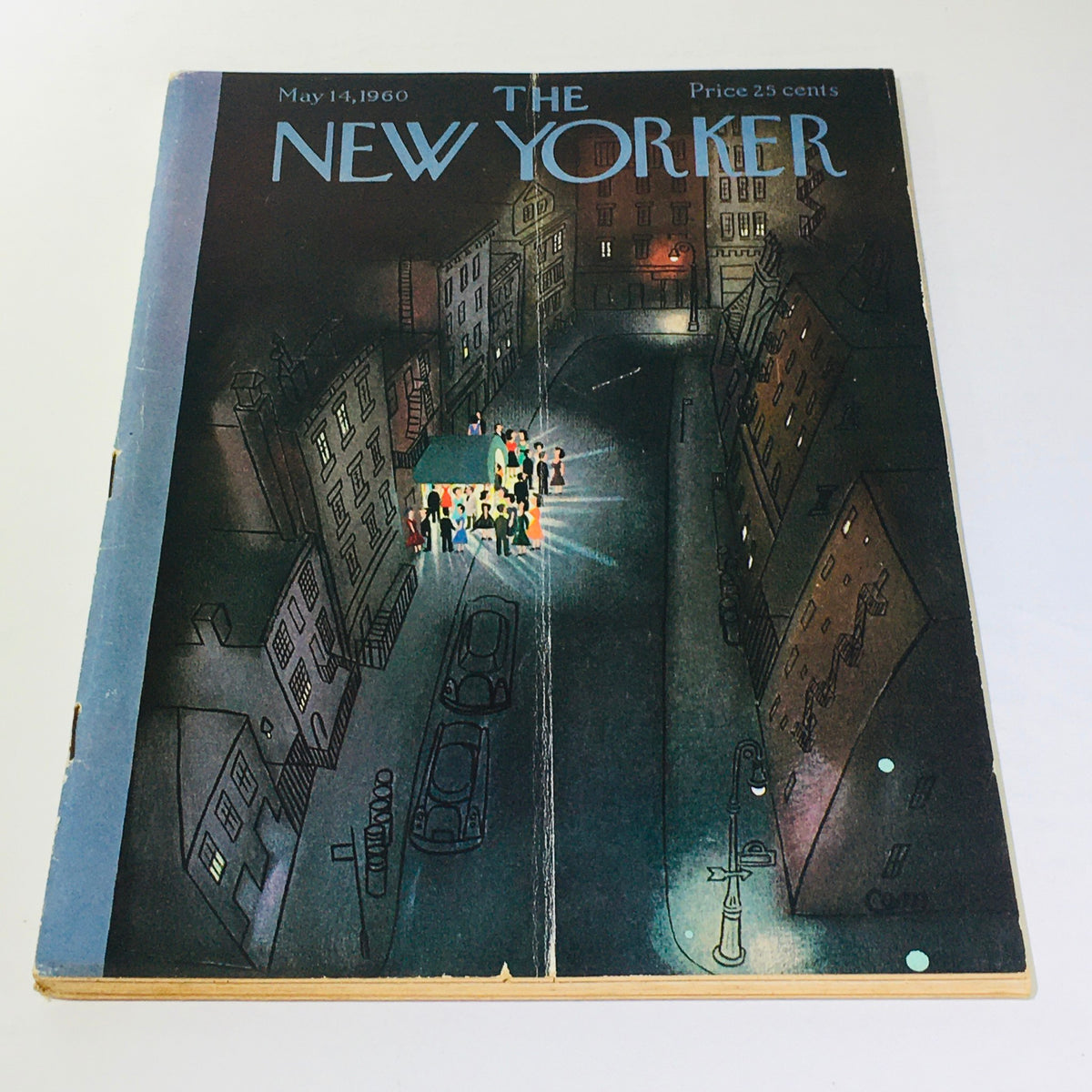 Cover of The New Yorker magazine dated May 14, 1960, featuring a captivating illustration by Charles E. Martin, showcasing a bustling street scene with figures gathered around a bright light in a vintage urban setting.