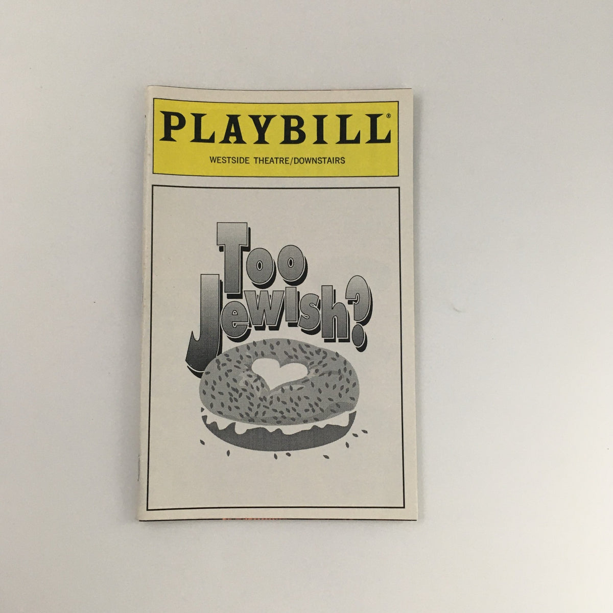 1995 Playbill for 'Too Jewish?' at Westside Theatre, featuring a humorous design with a donut and heart illustration.