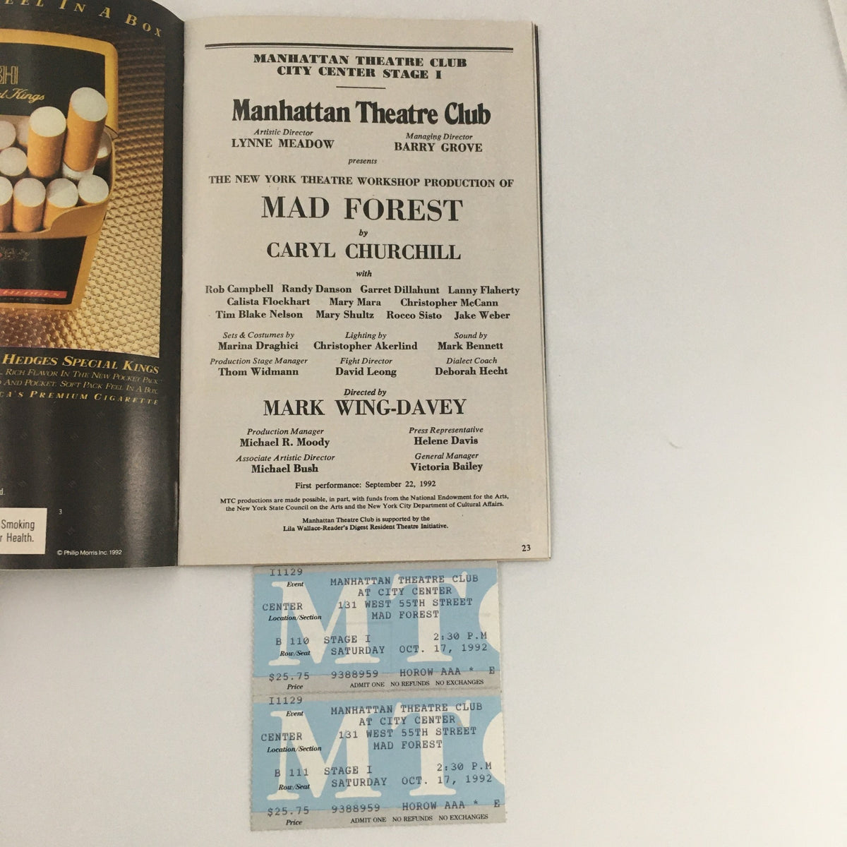 Back page of the 1992 Playbill for 'Mad Forest' along with original tickets, highlighting Caryl Churchill's work and additional context about the production.