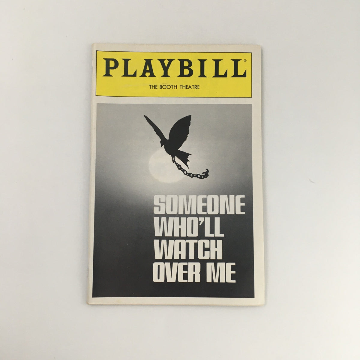 1992 Playbill for 'Someone Who'll Watch Over Me' from the Booth Theatre, featuring a striking black and white design with an image of a bird and chain.