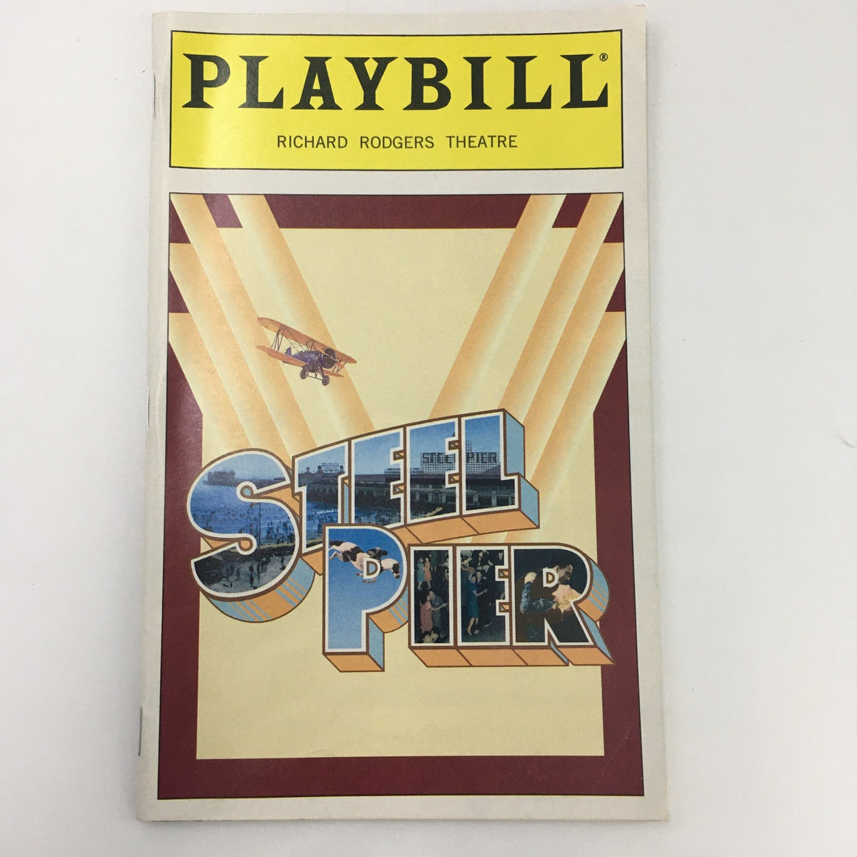 1997 Playbill for 'Steel Pier' at Richard Rodgers Theatre showcasing vibrant cover design with bold title and artistic elements.