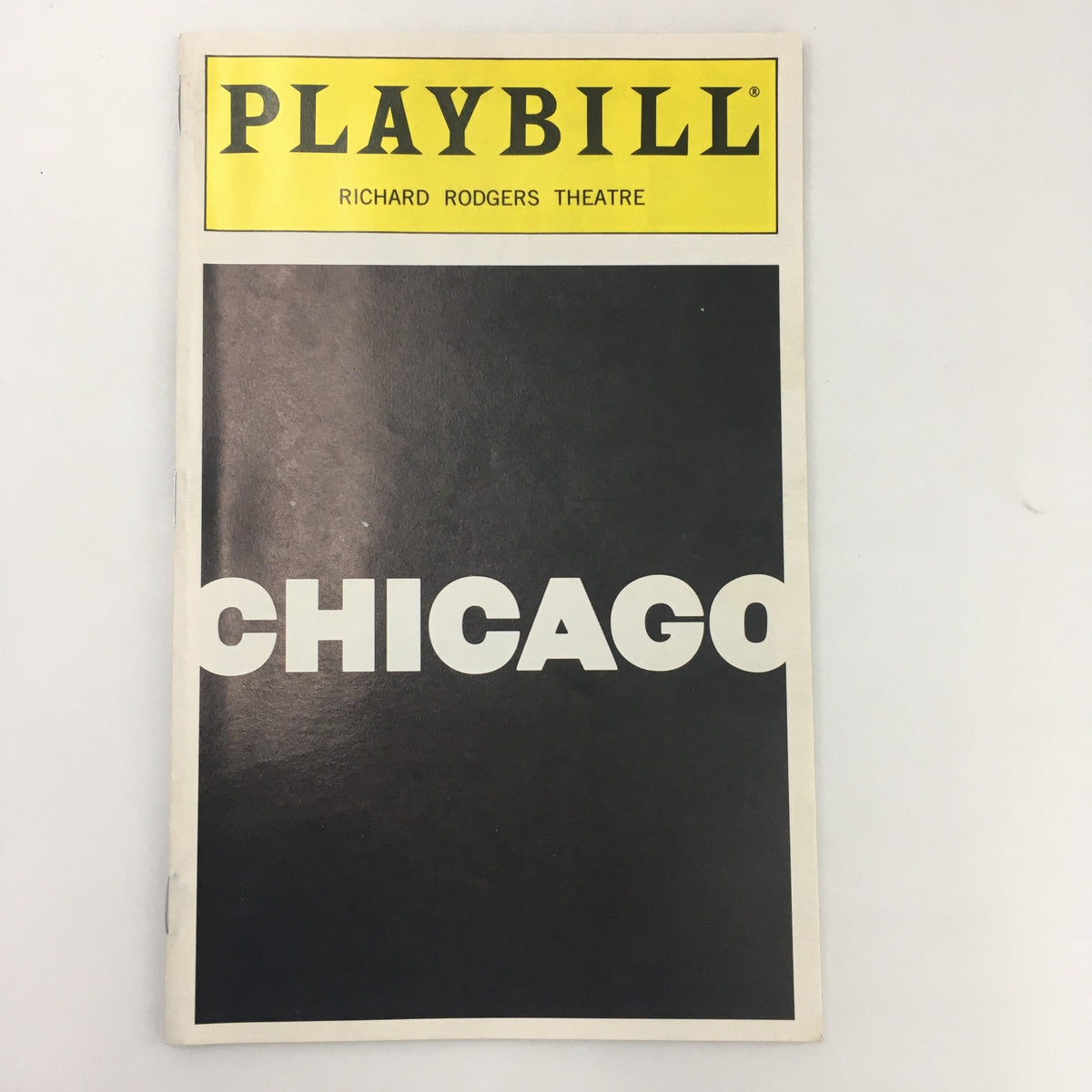 1997 Playbill for Chicago at Richard Rogers Theatre - front cover featuring bold title 'CHICAGO' against a black background.