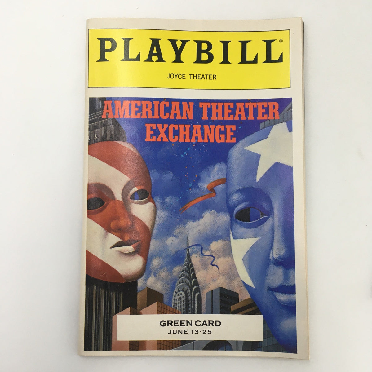 1988 Playbill for 'Green Card' production at Joyce Theater featuring bold artwork of masks and cityscape.