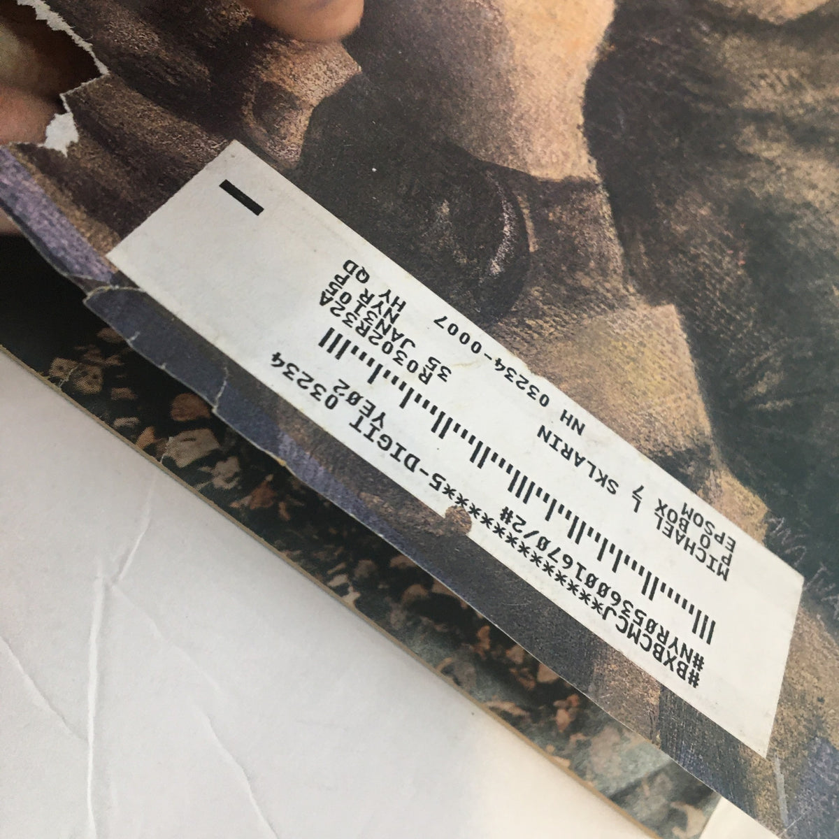 Close-up of the address label on the back of The New Yorker Full Magazine April 14 2003 Action by Ana Juan, showcasing its vintage character.