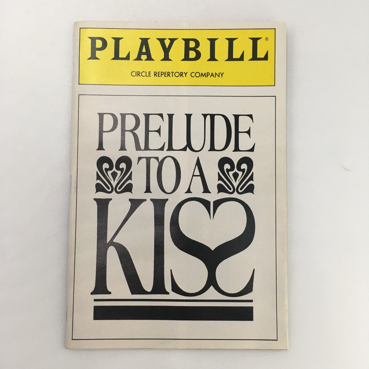1990 Playbill for 'Prelude To A Kiss' by Craig Lucas featuring a distinctive cover design showcasing the title in artistic typography.