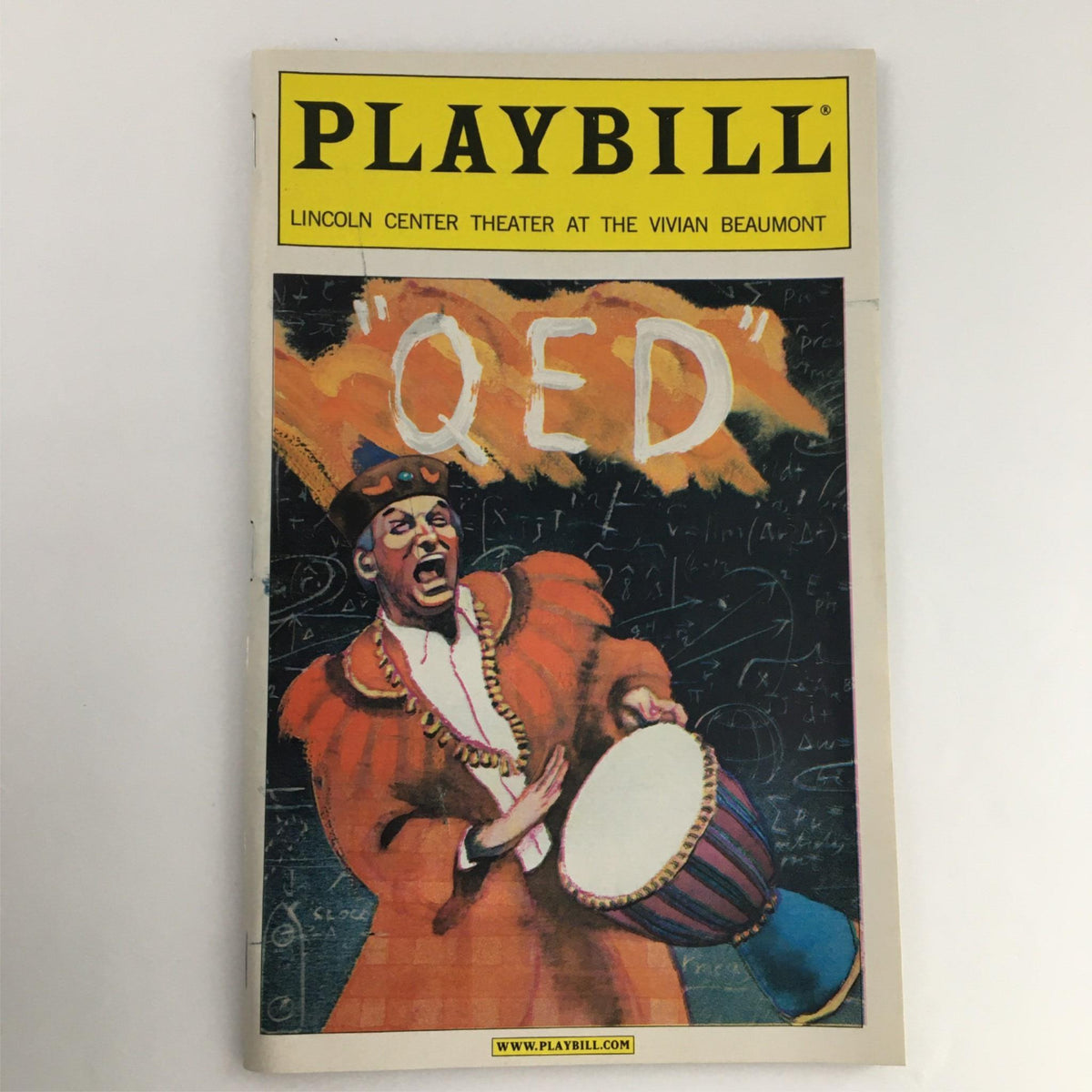 2001 Playbill QED by Lincoln Center Theater at the Vivan Beaumont featuring vibrant cover art and a character in costume with a drum.