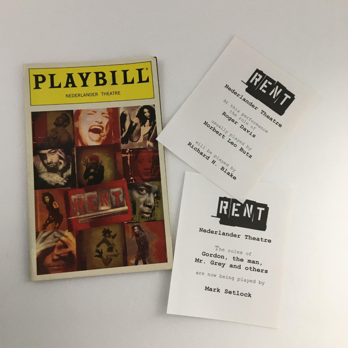 1998 Playbill Rent by Nederlander Theater, featuring a vibrant cover collage of cast photos and performer's names, showcasing the iconic musical 'Rent'.