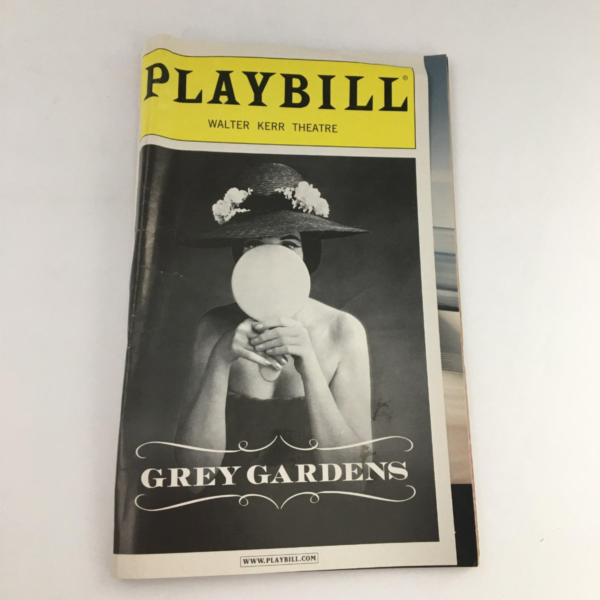 2007 Playbill for Grey Gardens at Walter Kerr Theatre featuring a black and white image of a woman holding a mirror, showcasing the theatrical production's iconic design.