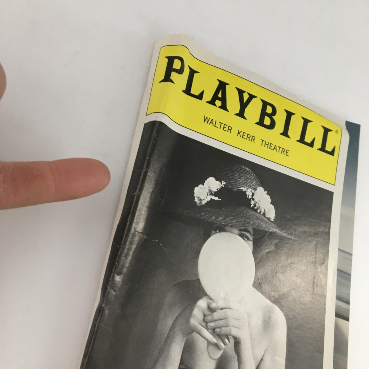Close-up view of the 2007 Playbill for Grey Gardens at Walter Kerr Theatre, highlighting a woman with a mirror and the signature Playbill logo.