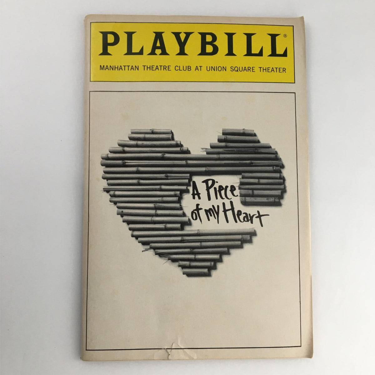 1991 Playbill for A Piece of My Heart by Manhattan Theatre Club, featuring a heart made of pipes on the cover.