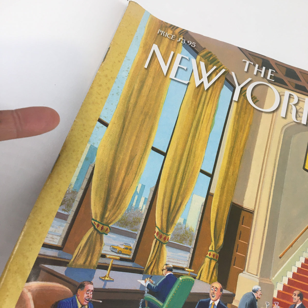 Close-up view of the cover of The New Yorker magazine dated January 12, 2004, highlighting the vibrant curtains and part of the artwork by Bruce McCall related to 'Lifestyles of The Rich & Felonious'.