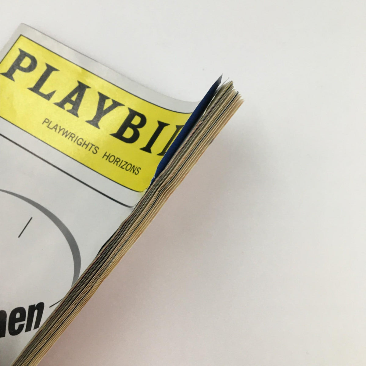 Another angle of the edge of the 2000 Playbill for The Moment When by Playwrights Horizons, highlighting its vintage condition.