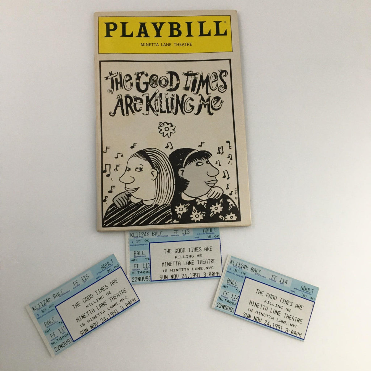 1991 Playbill for The Good Times are Killing Me displayed with original tickets from Minetta Lane Theatre.