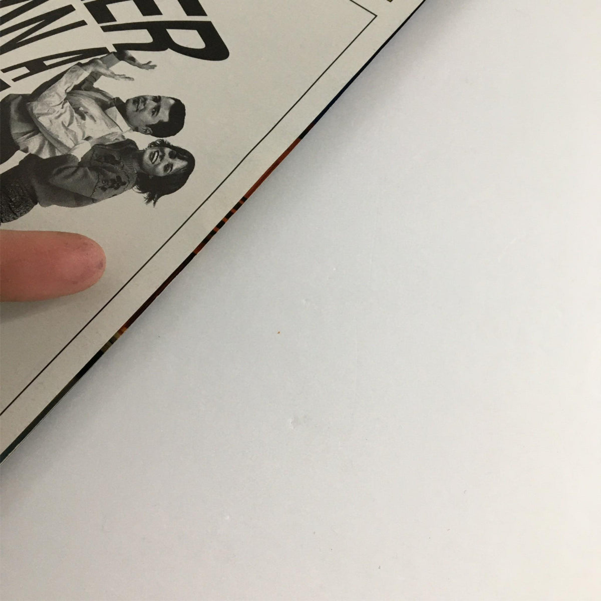 Close-up view of the 2000 Playbill for 'Taller Than a Dwarf' highlighting details of the cover and minor wear.