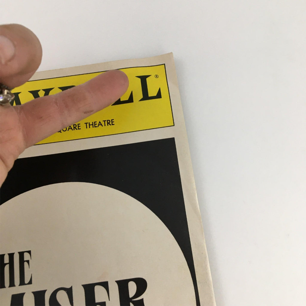 Cover page of the 1990 Playbill for The Miser by Circle in the Square Theater featuring the title and theater name.