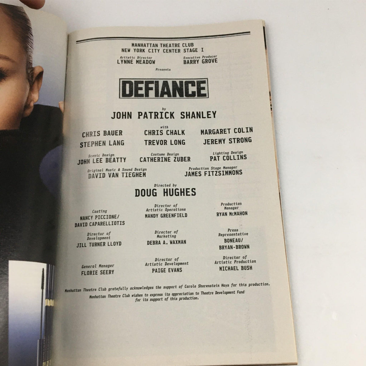 Another inside page of the Playbill for Defiance, featuring credits and cast information for the play written by John Patrick Shanley.