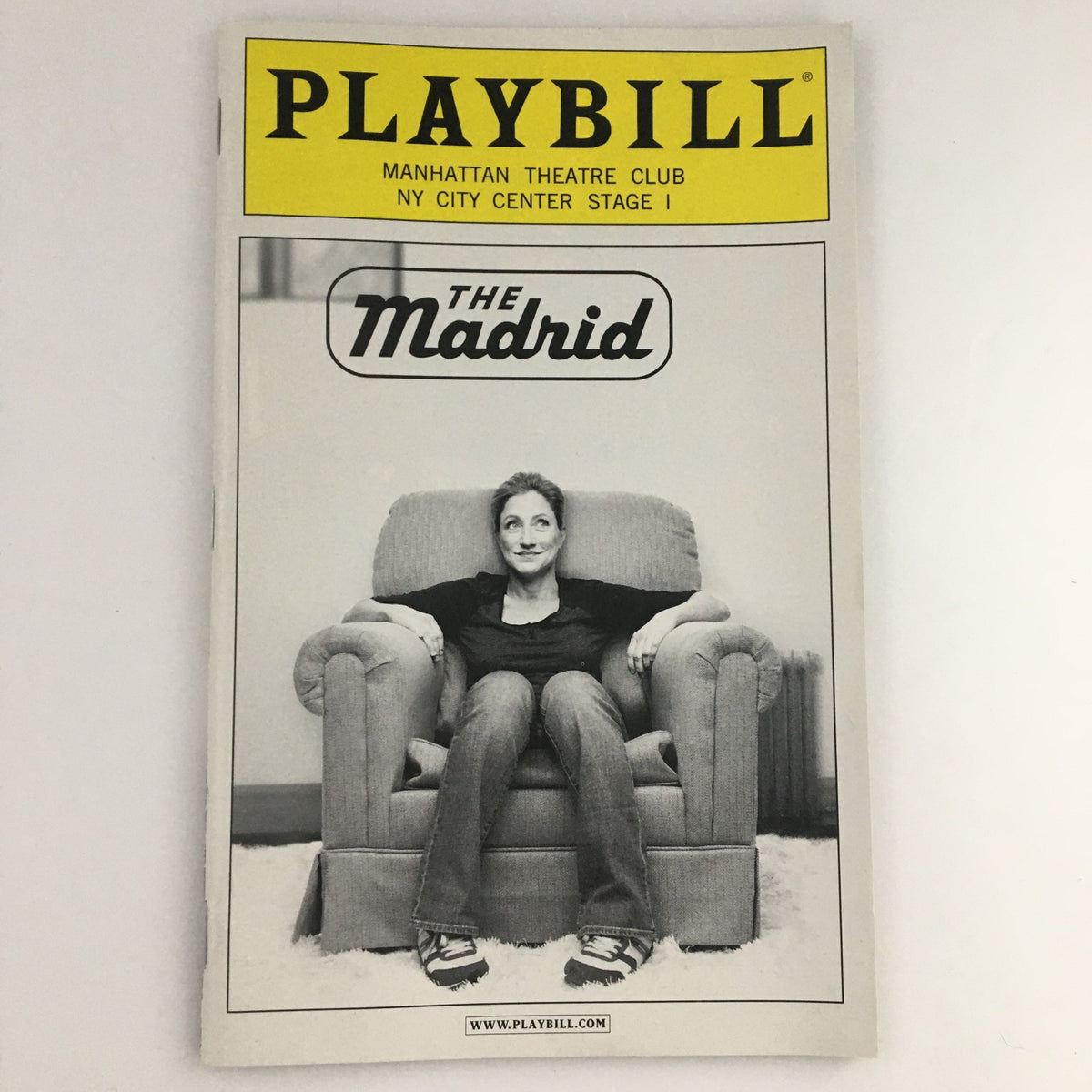Cover of the 2013 Playbill for 'The Madrid' at Manhattan Theatre Club featuring a woman sitting on a couch.