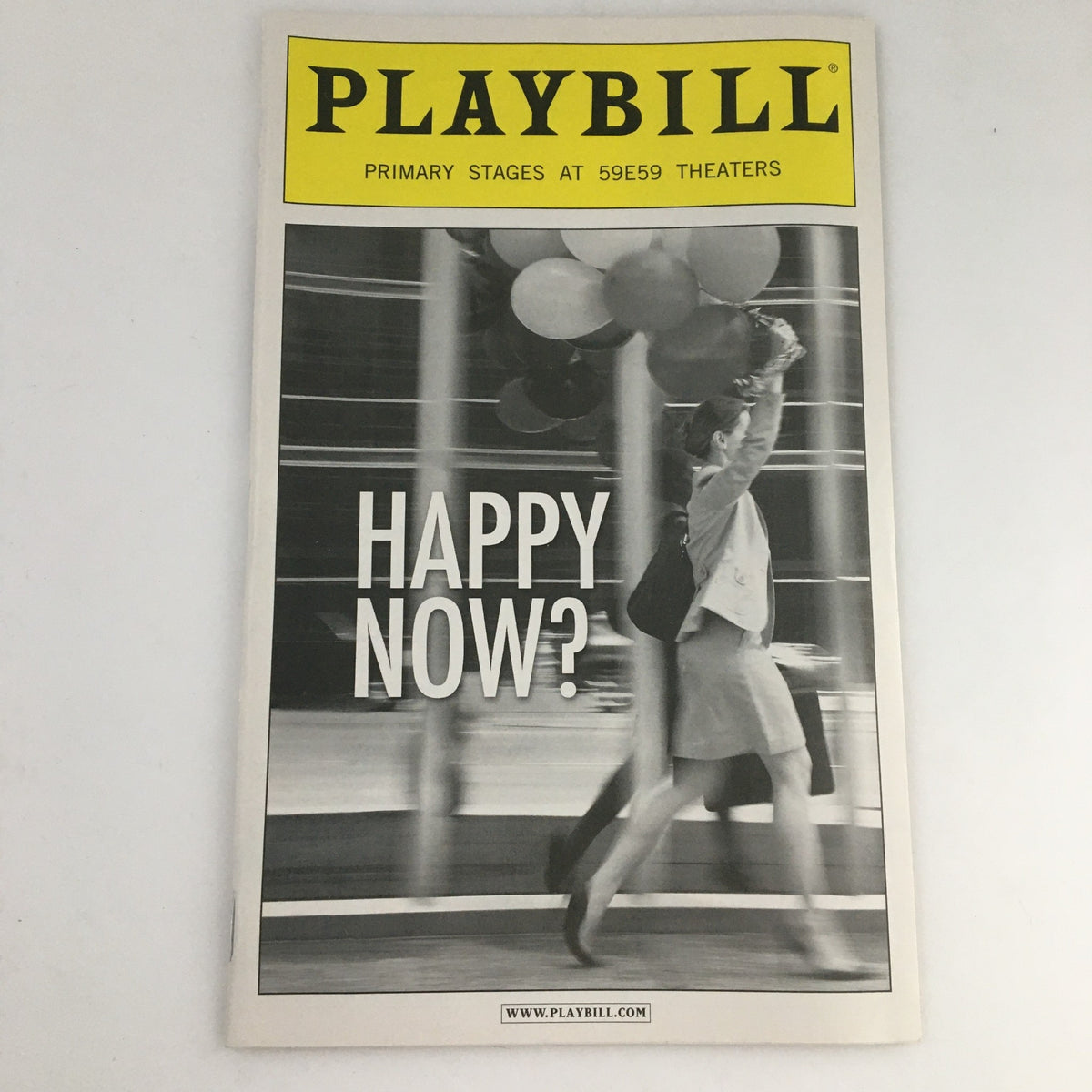 2010 Playbill for 'Happy Now?' with a prominent title on the cover, featuring a minimalistic black and white photograph.