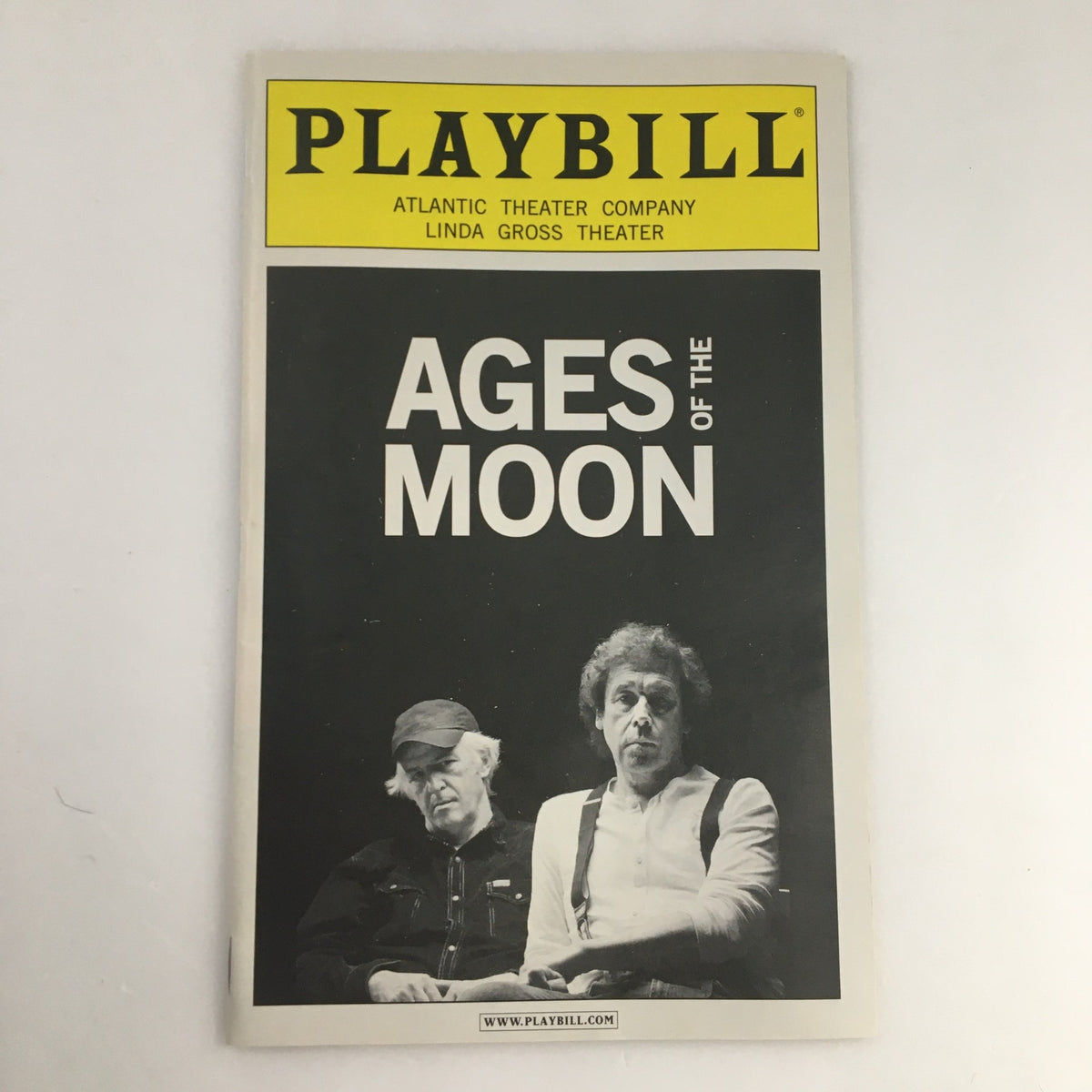 2010 Playbill for 'Ages of the Moon' by Sam Shepard, presented by the Atlantic Theater Company, featuring a minimalist cover design with prominent title text.