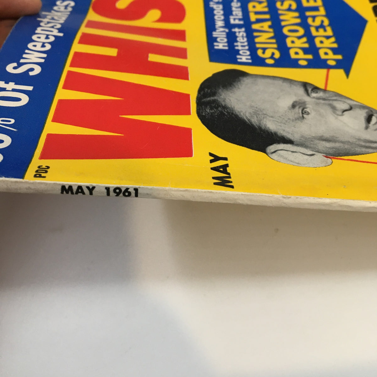Spine view of VTG Whisper Magazine May 1961 displaying the publication date and title, highlighting its vintage appeal.