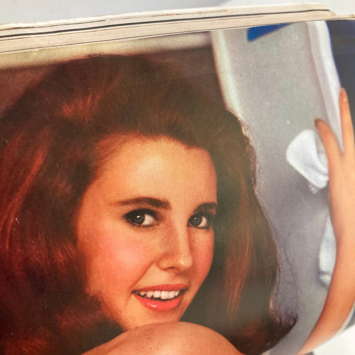 Close-up of Playmate Tish Howard from VTG Playboy Magazine July 1966, highlighting her stunning features in the iconic centerfold.