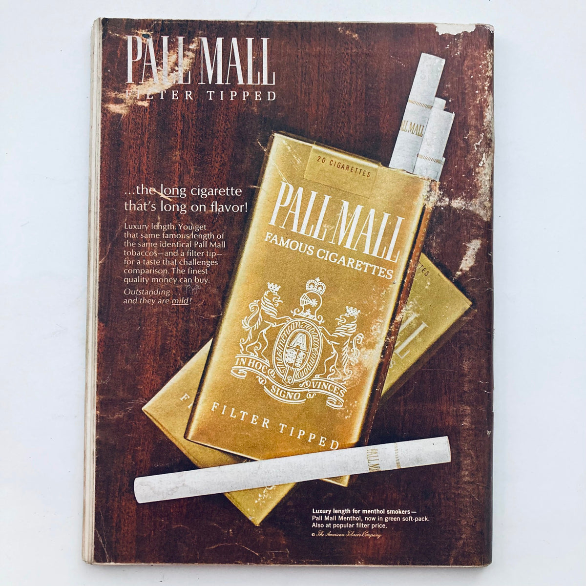 Advert for Pall Mall filter tipped cigarettes featured in vintage magazines, with an emphasis on the classic design and product details.