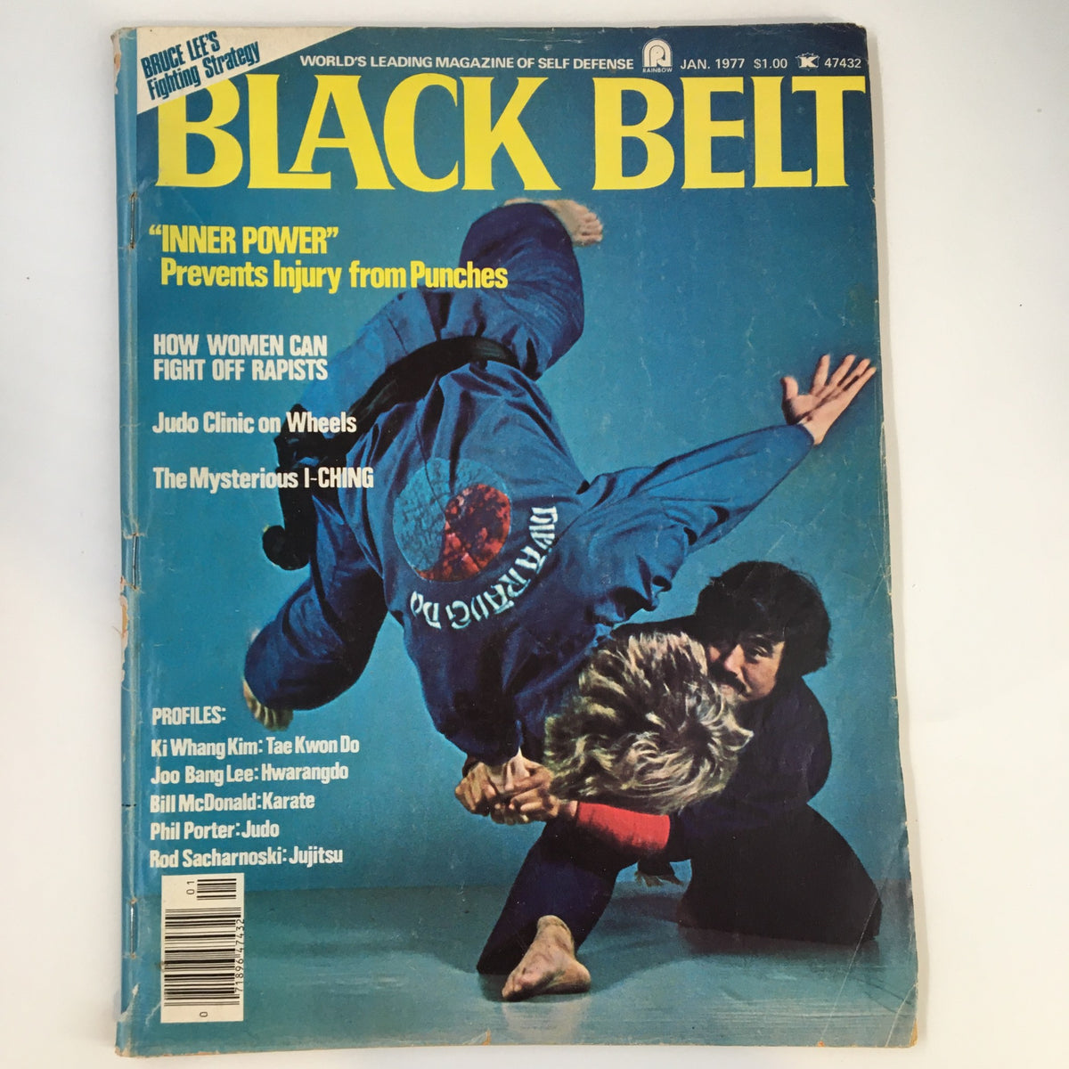 Cover of VTG Black Belt Magazine January 1977 featuring Joo Bang Lee demonstrating martial arts techniques, with headlines focused on self-defense and women empowerment, in good condition with minor wear.