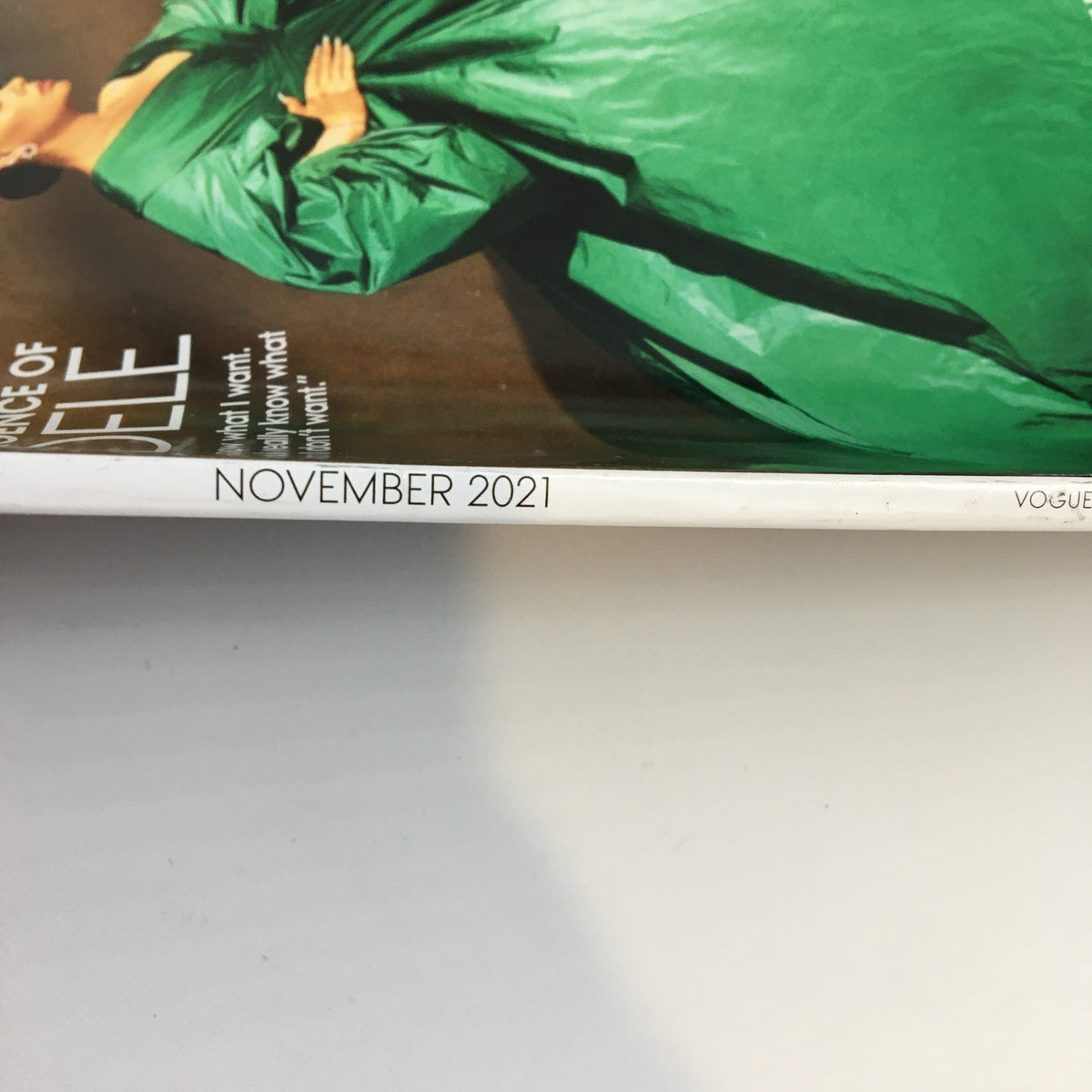 Side view of Vogue Magazine November 2021 showcasing the publication date, featuring Adele on the front cover, emphasizing her comeback in the music industry.