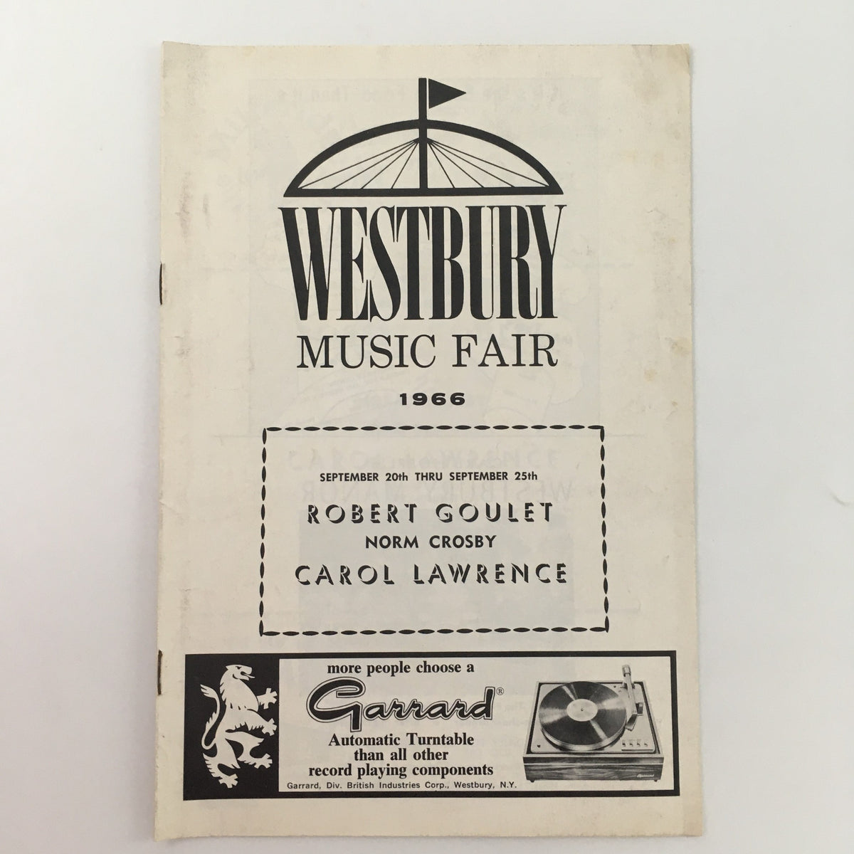 Cover of the 1966 Westbury Music Fair program for 'Robert Goulet in Person' starring Carol Lawrence, featuring event details and a vintage design.