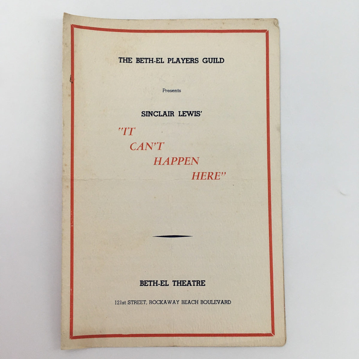 Cover page of the 1935 Beth-El Theatre production 'It Can’t Happen Here' by Sinclair Lewis, presented by The Beth-El Players Guild, featuring theater details and showcases the vintage design.