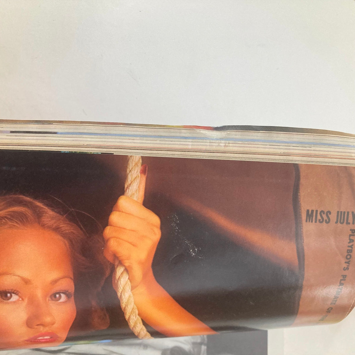 Close-up view of the VTG Playboy Magazine July 1976 featuring Playmate Deborah Borkman, showcasing the pages and centerfold.
