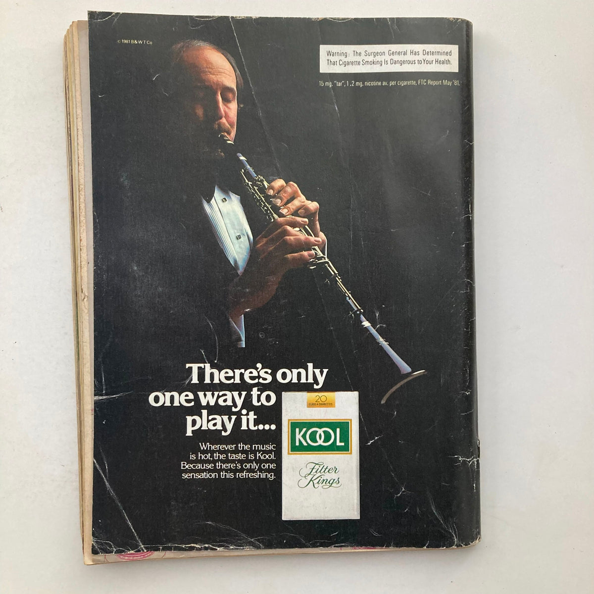 VTG Playboy Magazine January 1982, back cover showcasing a vintage Kool cigarette advertisement with a man playing a clarinet.