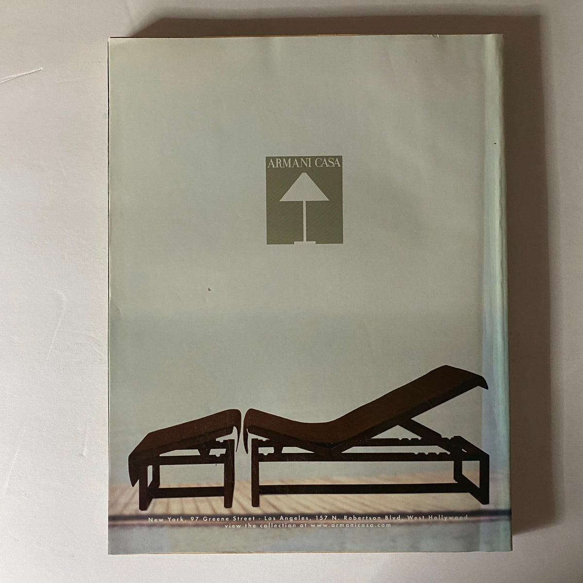 W Magazine March 2003 Gisele Bündchen Cover featuring an elegant Armani Casa furniture advertisement.