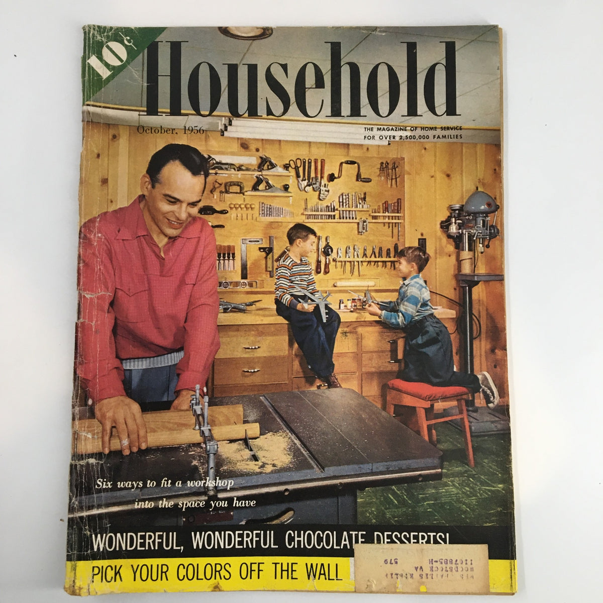 Vintage Household Magazine from October 1956 featuring the article 'Six Ways to Fit a Workshop Into Your Space.' The cover shows a workshop scene with a smiling man and two children engaged in creative activities amidst tools and woodworking materials.