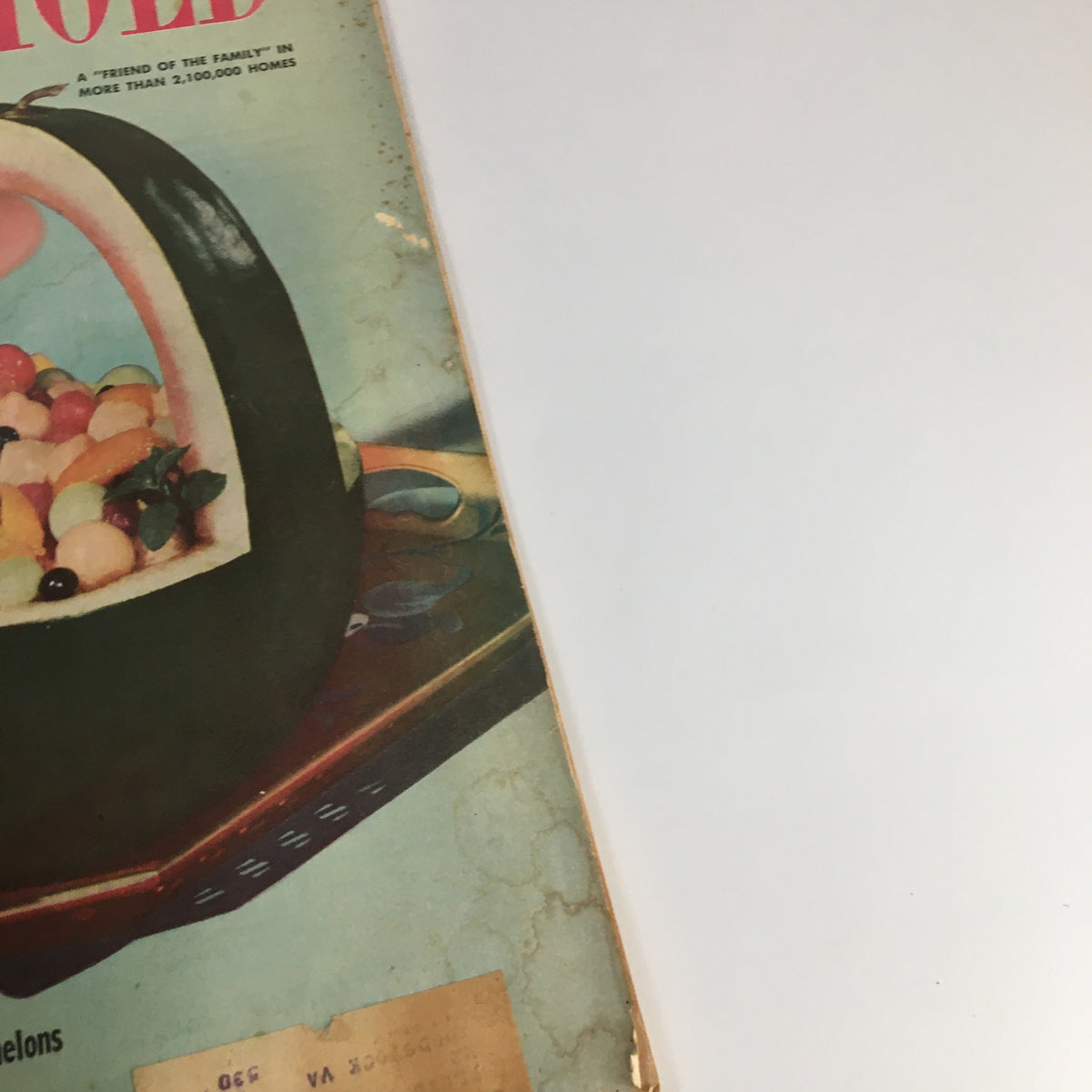 Close-up view of the VTG Household Magazine August 1952 cover showing a watermelon bowl filled with fruit.