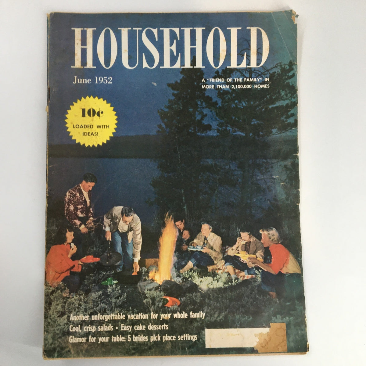 Cover of VTG Household Magazine from June 1952 featuring a camping scene with a group of people around a campfire, showcasing the title 'HOUSEHOLD' and highlighting themes of family vacations and cooking ideas.